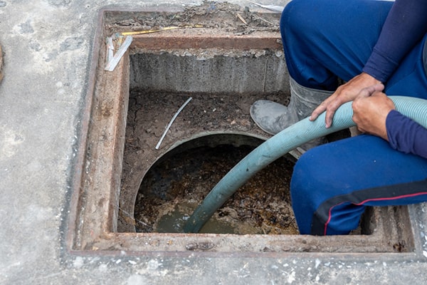 grease trap pumping involves the removal of built-up grease and waste from a grease trap system
